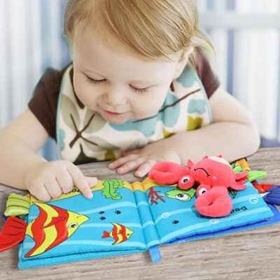 livre bebe en tissu eveil sensoriel